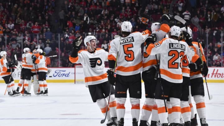 MONTREAL, QC - NOVEMBER 30: Philadelphia Flyers' players celebrate after defeating the Montreal Canadiens in the NHL game at the Bell Centre on November 30, 2019 in Montreal, Quebec, Canada. (Photo by Francois Lacasse/NHLI via Getty Images)