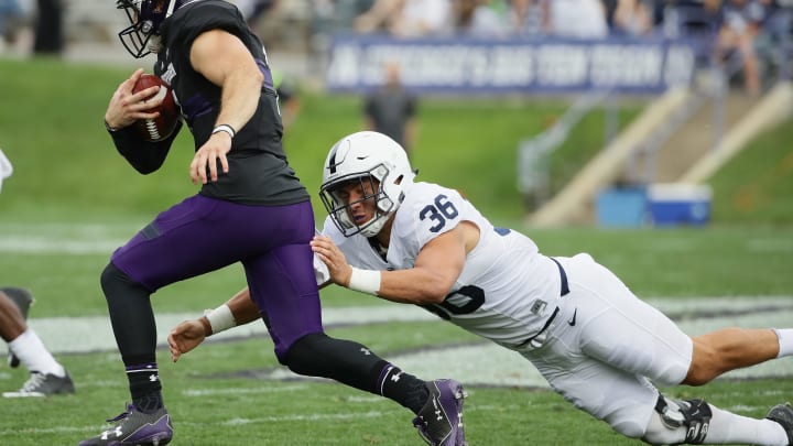 EVANSTON, IL – OCTOBER 07: Jan Johnson #36 of the Penn State Nittany Lions dives after Matt Alviti #7 of the Northwestern Wildcatss at Ryan Field on October 7, 2017 in Evanston, Illinois. (Photo by Jonathan Daniel/Getty Images)