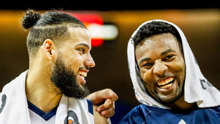 RENO, NV - JANUARY 09: Jordan Caroline #24 of the Nevada Wolf Pack and teammate Cody Martin #11 of the Nevada Wolf Pack smile after beating the San Jose State Spartans 92-53 at Lawlor Events Center on January 9, 2019 in Reno, Nevada. (Photo by Jonathan Devich/Getty Images)