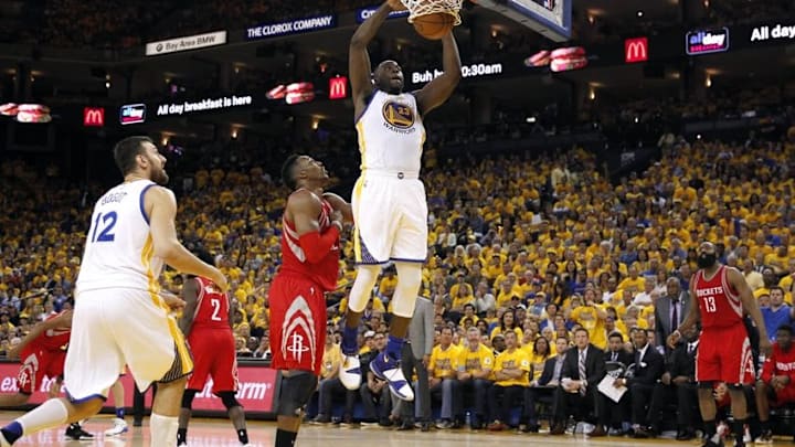 Apr 18, 2016; Oakland, CA, USA; Golden State Warriors forward Draymond Green (23) dunks the ball against the Houston Rockets in the fourth quarter in game two of the first round of the NBA Playoffs at Oracle Arena. The Warriors defeated the Rockets 115-106. Mandatory Credit: Cary Edmondson-USA TODAY Sports