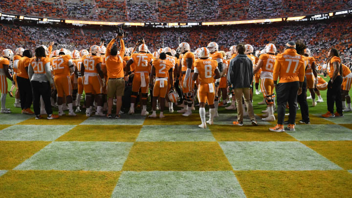The Tennessee Volunteers football team gather before the start of warmups before the start of the NCAA college football game between Tennessee and Ole Miss in Knoxville, Tenn. on Saturday, October 16, 2021.Utvom1016