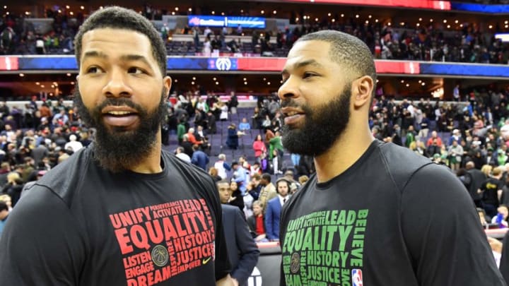 Feb 8, 2018; Washington, DC, USA; Washington Wizards forward Markieff Morris (left) talks with twin brother Boston Celtics forward Marcus Morris (right) after the game at Capital One Arena. Mandatory Credit: Brad Mills-USA TODAY Sports