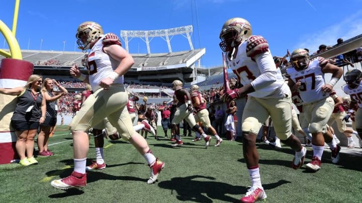 Apr 9, 2016; Orlando, FL, USA; Florida State runs out of the tunnel prior to the Florida State spring game at the Citrus Bowl. Mandatory Credit: Logan Bowles-USA TODAY Sports