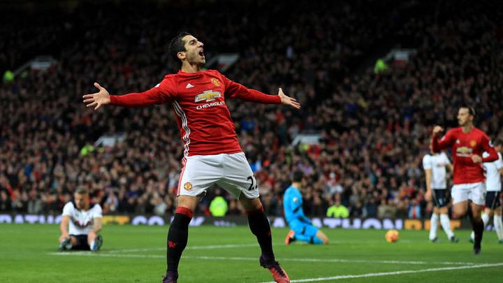 MANCHESTER, ENGLAND - DECEMBER 11: Henrikh Mkhitaryan of Manchester United celebrates scoring the opening goal during the Premier League match between Manchester United and Tottenham Hotspur at Old Trafford on December 11, 2016 in Manchester, England. (Photo by Richard Heathcote/Getty Images)