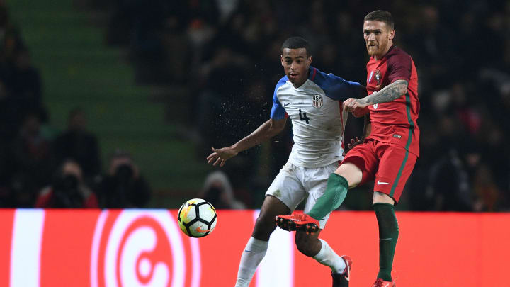 LEIRIA, PORTUGAL – NOVEMBER 14: Antunes of Portugal competes for the ball with Tyler Adams of USA during the International Friendly match between Portugal and USA at Estadio Municipal Leiria on November 14, 2017 in Leiria, Portugal. (Photo by Octavio Passos/Getty Images)