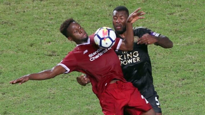 HONG KONG – JULY 22: Divock Origi of Liverpool battles with Wes Morgan Leicester City of during the Premier League Asia Trophy match between Liverpool FC and Leicester City FC at Hong Kong Stadium on July 22, 2017 in Hong Kong, Hong Kong. (Photo by Stanley Chou/Getty Images )