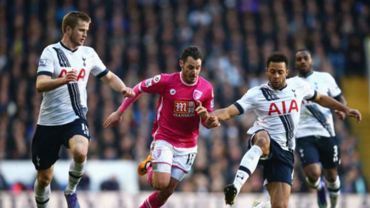 LONDON, ENGLAND - MARCH 20: Adam Smith of Bournemouth attempts to beat Mousa Dembele (R) and Eric Dier of Tottenham Hotspur (L) during the Barclays Premier League match between Tottenham Hotspur and A.F.C. Bournemouth at White Hart Lane on March 20, 2016 in London, United Kingdom. (Photo by Paul Gilham/Getty Images)