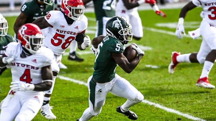 Michigan State’s Jayden Reed returns a kick during the first quarter on Saturday, Oct. 24, 2020, at Spartan Stadium in East Lansing. 201024 Msu Rutgers 093a