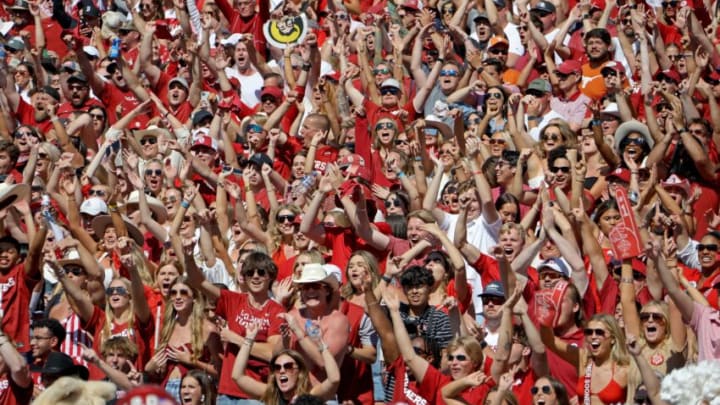 Oklahoma fans cheer during the Red River Rivalry college football game between the University of Oklahoma Sooners (OU) and the University of Texas (UT) Longhorns at the Cotton Bowl in Dallas, Saturday, Oct. 7, 2023. Oklahoma won 34-30.