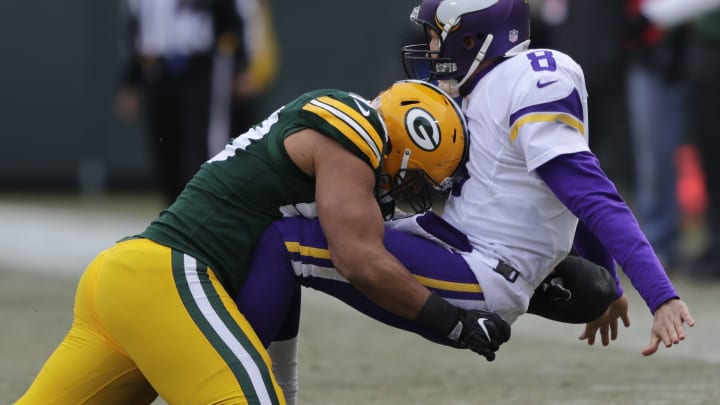 Dec 24, 2016; Green Bay, WI, USA; Green Bay Packers linebacker Nick Perry (53) hits Minnesota Vikings quarterback Sam Bradford (8) in the third quarter at Lambeau Field. Mandatory Credit: Dan Powers/USA TODAY NETWORK-Wisconsin via USA TODAY Sports