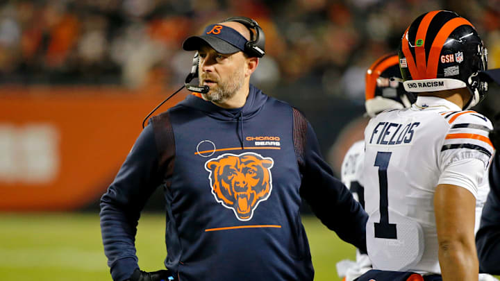 Dec 20, 2021; Chicago, Illinois, USA; Chicago Bears head coach Matt Nagy looks on after their first possession against the Minnesota Vikings as quarterback Justin Fields (1) walks off the field during the first quarter at Soldier Field. Mandatory Credit: Jon Durr-USA TODAY Sports