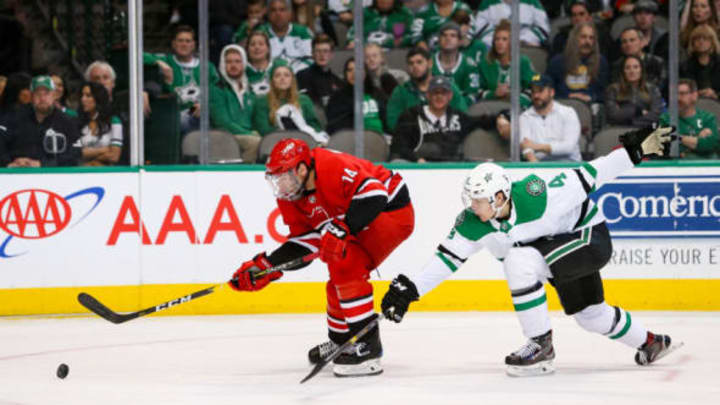 DALLAS, TX – FEBRUARY 23: Dallas Stars defenseman Miro Heiskanen (4) stretches to defend Carolina Hurricanes right wing Justin Williams (14) during the game between the Carolina Hurricanes and the Dallas Stars on February 23, 2019 at American Airlines Center in Dallas, TX. (Photo by Andrew Dieb/Icon Sportswire via Getty Images)