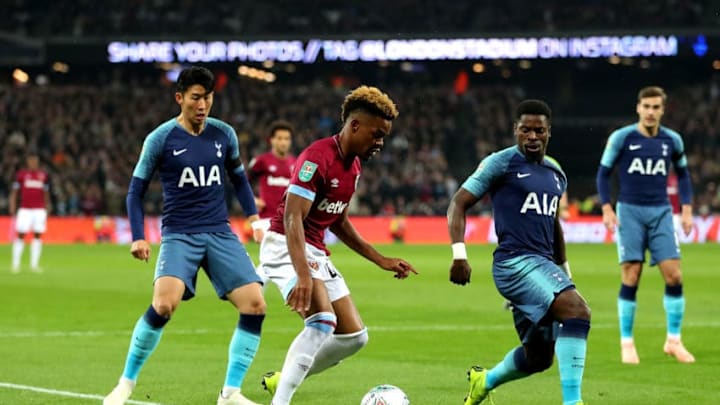 LONDON, ENGLAND - OCTOBER 31: Grady Diangana of West Ham United is challenged by Heung-Min Son of Tottenham Hotspur and Serge Aurier of Tottenham Hotspur during the Carabao Cup Fourth Round match between West Ham United and Tottenham Hotspur at London Stadium on October 31, 2018 in London, England. (Photo by Catherine Ivill/Getty Images)