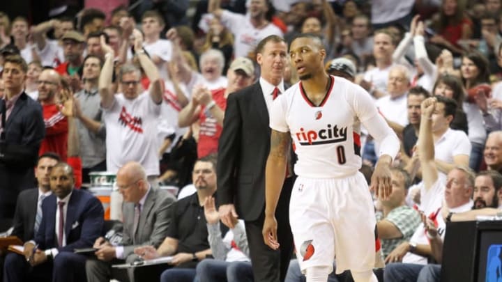 May 9, 2016; Portland, OR, USA; Portland Trail Blazers guard Damian Lillard (0) reacts after making a basket over Golden State Warriors in game four of the second round of the NBA Playoffs at Moda Center at the Rose Quarter. Mandatory Credit: Jaime Valdez-USA TODAY Sports