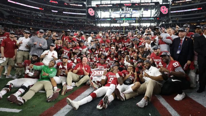 ARLINGTON, TX - DECEMBER 02: The Oklahoma Sooners pose for a team photo after winning the Big 12 Championship against the TCU Horned Frogs 41-17 at AT