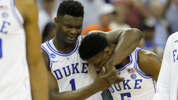 COLUMBIA, SOUTH CAROLINA - MARCH 24: Zion Williamson #1 2 and RJ Barrett #5 of the Duke Blue Devils celebrate after defeating the UCF Knights in the second round game of the 2019 NCAA Men's Basketball Tournament at Colonial Life Arena on March 24, 2019 in Columbia, South Carolina. (Photo by Kevin C. Cox/Getty Images)