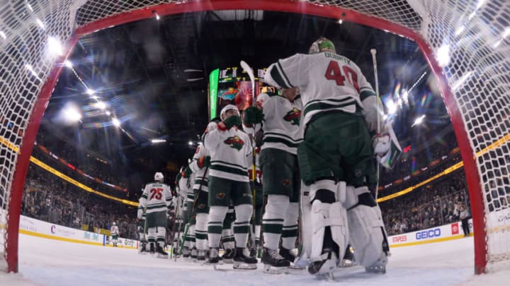 LAS VEGAS, NV - MARCH 29: Devan Dubnyk #40 of the Minnesota Wild celebrates with teammates after defeating the Vegas Golden Knights at T-Mobile Arena on March 29, 2019 in Las Vegas, Nevada. The Wild won 3-2. (Photo by Jeff Bottari/NHLI via Getty Images)