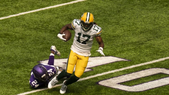 MINNEAPOLIS, MN - SEPTEMBER 13: Davante Adams #17 of the Green Bay Packers runs with the ball after catching a pass in the second quarter of the game against the Minnesota Vikings at U.S. Bank Stadium on September 13, 2020 in Minneapolis, Minnesota. (Photo by Stephen Maturen/Getty Images)