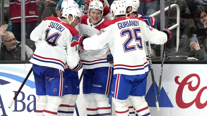 SAN JOSE, CALIFORNIA - FEBRUARY 28: Kaiden Guhle #21 of the Montreal Canadiens is congratulated by teammates after scoring a goal against the San Jose Sharks during the third period at SAP Center on February 28, 2023 in San Jose, California. (Photo by Thearon W. Henderson/Getty Images)