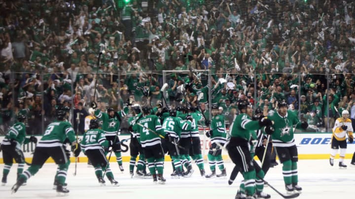 DALLAS, TEXAS - APRIL 22: The Dallas Stars celebrate the game winning goal against the Nashville Predators in overtime of Game Six of the Western Conference First Round during the 2019 Stanley Cup Playoffs at American Airlines Center on April 22, 2019 in Dallas, Texas. The Stars advanced to the next round of the 2019 Stanley Cup Playoffs. (Photo by Ronald Martinez/Getty Images)