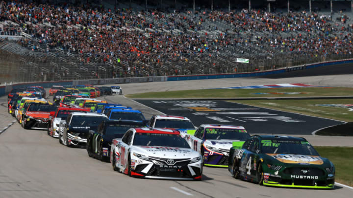 FORT WORTH, TEXAS - NOVEMBER 03: Kevin Harvick, driver of the #4 Busch Beer/Ducks Unlimited Ford, and Erik Jones, driver of the #20 Sport Clips Toyota, lead the field to turn one at the start of the Monster Energy NASCAR Cup Series AAA Texas 500 at Texas Motor Speedway on November 03, 2019 in Fort Worth, Texas. (Photo by Sean Gardner/Getty Images)