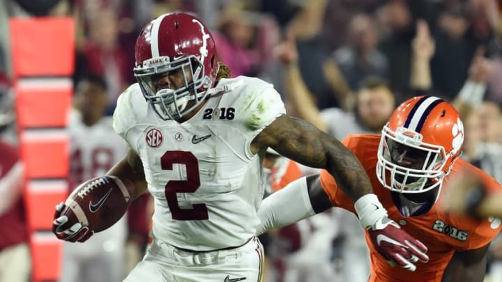 Jan 11, 2016; Glendale, AZ, USA; Alabama Crimson Tide running back Derrick Henry (2) breaks away from Clemson Tigers safety Jayron Kearse (1) to score a touchdown in the first quarter in the 2016 CFP National Championship at University of Phoenix Stadium. Mandatory Credit: Matt Kartozian-USA TODAY Sports