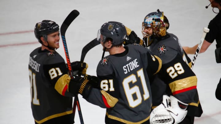 LAS VEGAS, NV - APRIL 14: Mark Stone (61) of the Vegas Golden Knights celebrates with teammates Jonathan Marchessault (81) and Marc-Andre Fleury (29) after winning a Stanley Cup Playoffs first round game between the San Jose Sharks and the Vegas Golden Knights on April 14, 2019 at T-Mobile Arena in Las Vegas, Nevada. (Photo by Jeff Speer/Icon Sportswire via Getty Images)