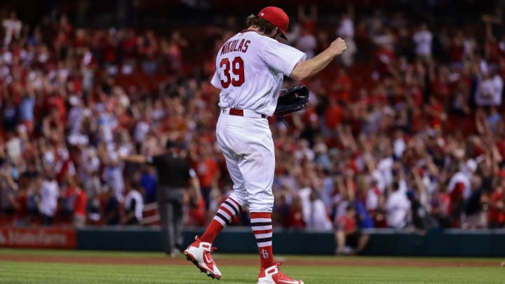 ST. LOUIS, MO – MAY 21: St. Louis Cardinals starting pitcher Miles Mikolas (39) celebrates throwing a complete game at the conclusion of the ninth inning of a baseball game. The St. Louis Cardinals defeated the Kansas City Royals 6-0 May 21, 2018, at Busch Stadium in St. Louis, MO. (Photo by Tim Spyers/Icon Sportswire via Getty Images)