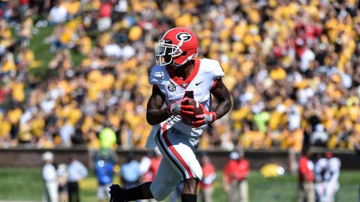 COLUMBIA, MO - SEPTEMBER 22: Wide receiver Mecole Hardman #4 of the Georgia Bulldogs runs for a touchdown pass against the Missouri Tigers in the fourth quarter at Memorial Stadium on September 22, 2018 in Columbia, Missouri. (Photo by Ed Zurga/Getty Images)