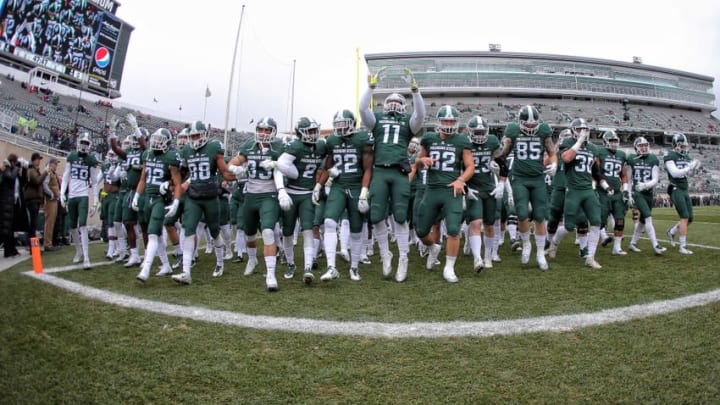 Nov 19, 2016; East Lansing, MI, USA; Michigan State Spartans take the field prior to their game against the Ohio State Buckeyes at Spartan Stadium. Mandatory Credit: Mike Carter-USA TODAY Sports