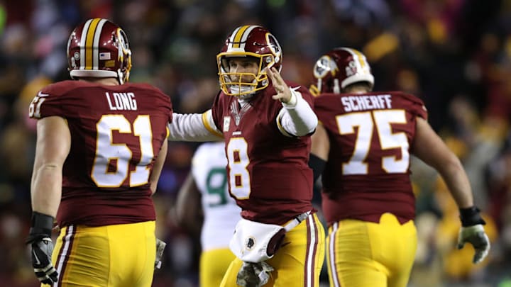 LANDOVER, MD - NOVEMBER 20: Quarterback Kirk Cousins #8 of the Washington Redskins celebrates with teammate center Spencer Long #61 after throwing a fourth quarter touchdown pass against the Green Bay Packers at FedExField on November 20, 2016 in Landover, Maryland. (Photo by Patrick Smith/Getty Images)