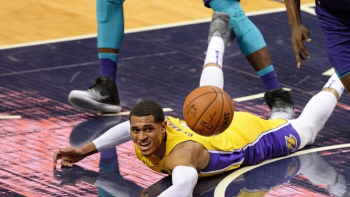 CHARLOTTE, USA - DECEMBER 9: Jordan Clarkson of Los Angeles Lakers dives after the ball during the NBA match between LA Lakers vs Charlotte Hornets at the Spectrum arena in Charlotte, NC, United States on December 9, 2017. (Photo by Peter Zay/Anadolu Agency/Getty Images)