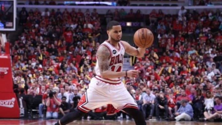 Apr 20, 2014; Chicago, IL, USA; Chicago Bulls guard D.J. Augustin (14) with the ball during the second half of game one of the first round of the 2014 NBA Playoffs against the Washington Wizards at the United Center. Washington won 102-93. Mandatory Credit: Dennis Wierzbicki-USA TODAY Sports