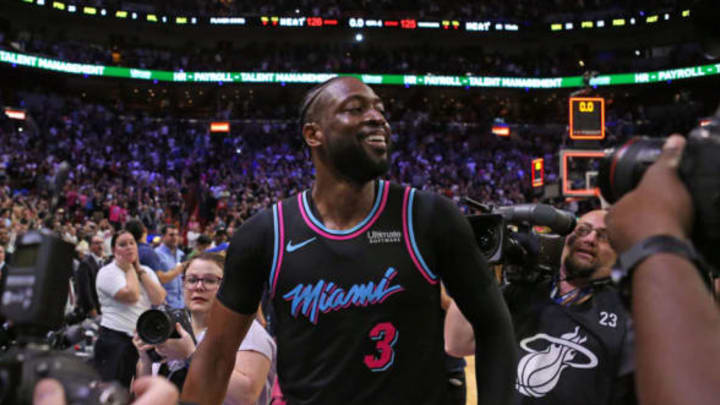 The Miami Heat's Dwyane Wade (3) celebrates after hitting a 3-pointer at the buzzer in the fourth quarter against the Golden State Warrios at AmericanAirlines Arena in Miami on Wednesday, Feb. 27, 2019. The Heat won, 126-125. (David Santiago/Miami Herald/TNS via Getty Images)