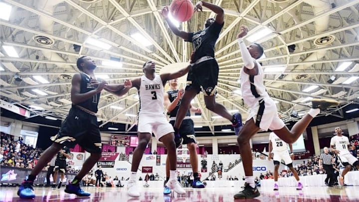 SPRINGFIELD, MA - JANUARY 15: Montez Mathis #23 of the John Carroll School is fouled by Louis King #2 of Hudson Catholic High School during the 2018 Spalding Hoopall Classic at Blake Arena at Springfield College on January 15, 2018 in Springfield, Massachusetts. (Photo by Adam Glanzman/Getty Images)