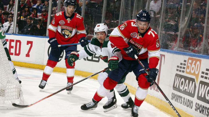 SUNRISE, FL - MARCH 8: Dryden Hunt #73 of the Florida Panthers skates with the puck against Jared Spurgeon #46 of the Minnesota Wild at the BB&T Center on March 8, 2019 in Sunrise, Florida. (Photo by Eliot J. Schechter/NHLI via Getty Images)