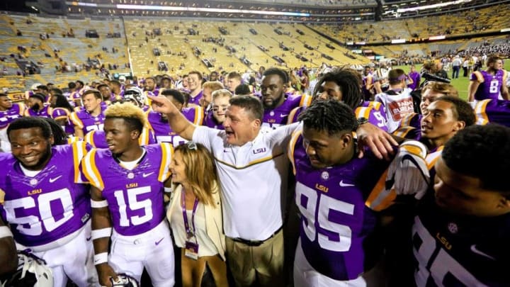 Oct 15, 2016; Baton Rouge, LA, USA; LSU Tigers head coach Ed Orgeron celebrates with his team following a win against the Southern Miss Golden Eagles in a game at Tiger Stadium. LSU defeated Southern Mississippi 45-10. Mandatory Credit: Derick E. Hingle-USA TODAY Sports