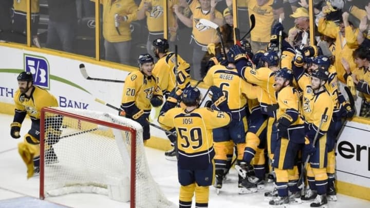 Nashville Predators players celebrate their overtime win. Mandatory Credit: George Walker IV/The Tennessean via USA TODAY NETWORK