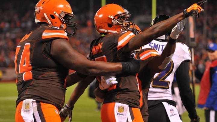 Nov 30, 2015; Cleveland, OH, USA; Cleveland Browns wide receiver Marlon Moore (15) celebrates with offensive tackle Cameron Erving (74) and running back Duke Johnson (29) after a touchdown against the Baltimore Ravens during the second quarter at FirstEnergy Stadium. Mandatory Credit: Ken Blaze-USA TODAY Sports