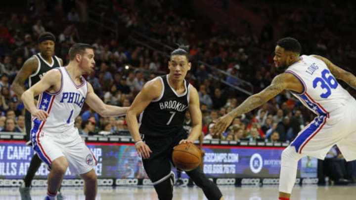PHILADELPHIA, PA – APRIL 04: Jeremy Lin #7 of the Brooklyn Nets drives to the basket as T.J. McConnell #1 and Shawn Long #36 of the Philadelphia 76ers defend in the first half during an NBA game at Wells Fargo Center on April 4, 2017 in Philadelphia, Pennsylvania. The Nets defeated 76ers 141-118. (Photo by Rich Schultz/Getty Images)