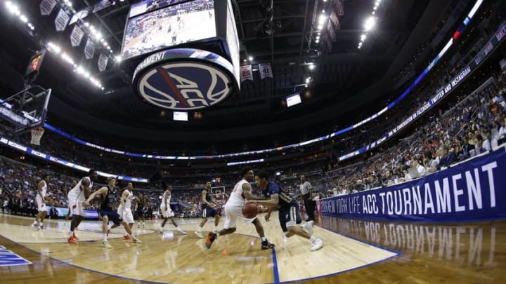 Mar 9, 2016; Washington, DC, USA; Georgia Tech Yellow Jackets guard Tadric Jackson (1) dribbles the ball as Clemson Tigers guard Gabe DeVoe (10) defends in the second half during day two of the ACC conference tournament at Verizon Center. The Yellow Jackets won 88-85 in overtime. Mandatory Credit: Geoff Burke-USA TODAY Sports