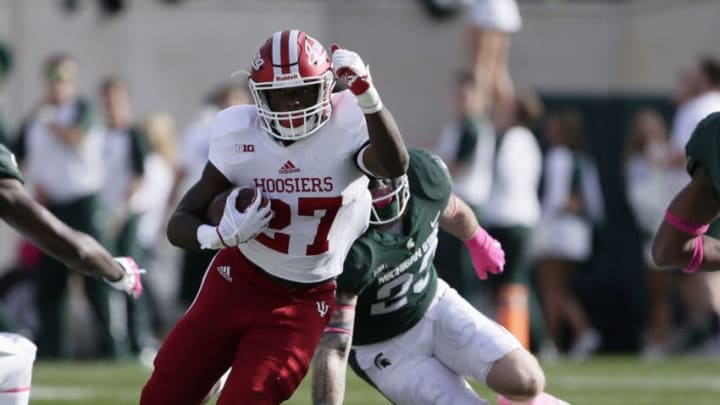 EAST LANSING, MI - OCTOBER 21: Running back Morgan Ellison #27 of the Indiana Hoosiers is pursued by linebacker Chris Frey #23 of the Michigan State Spartans during the first half at Spartan Stadium on October 21, 2017 in East Lansing, Michigan. (Photo by Duane Burleson/Getty Images)