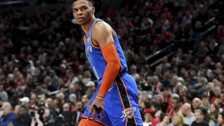 Russell Westbrook #0 of the Oklahoma City Thunder looks over at the Portland Trail Blazers bench in the first half of Game One of the Western Conference quarterfinals during the 2019 NBA Playoffs at Moda Center on April 14, 2019 in Portland, Oregon. NOTE TO USER: User expressly acknowledges and agrees that, by downloading and or using this photograph, User is consenting to the terms and conditions of the Getty Images License Agreement. (Photo by Steve Dykes/Getty Images)