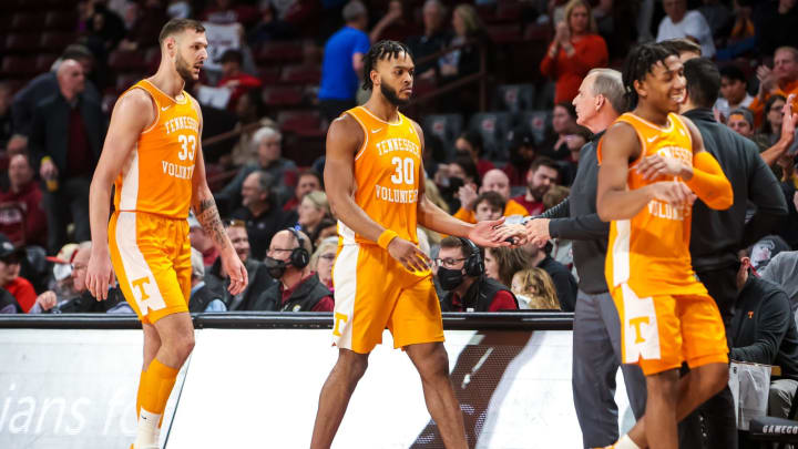 Feb 5, 2022; Columbia, South Carolina, USA; Tennessee Volunteers guard Josiah-Jordan James (30) is congratulated by Tennessee Volunteers head coach Rick Barnes leaving the game against the South Carolina Gamecocks in the second half at Colonial Life Arena. Mandatory Credit: Jeff Blake-USA TODAY Sports