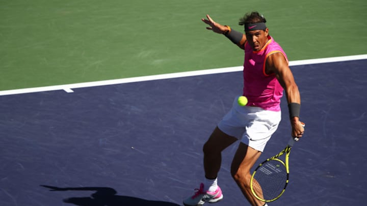 INDIAN WELLS, CALIFORNIA - MARCH 13: Rafael Nadal of Spain plays a backhand volley against Filip Krajinovic of Serbia during their men's singles fourth round match on day ten of the BNP Paribas Open at the Indian Wells Tennis Garden on March 13, 2019 in Indian Wells, California. (Photo by Clive Brunskill/Getty Images)