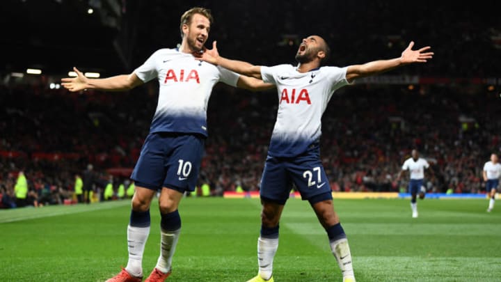 MANCHESTER, ENGLAND - AUGUST 27: Lucas Moura of Tottenham Hotspur celebrates with Harry Kane of Tottenham Hotspur after scoring his second goal and his team's third goal during the Premier League match between Manchester United and Tottenham Hotspur at Old Trafford on August 27, 2018 in Manchester, United Kingdom. (Photo by Clive Mason/Getty Images)