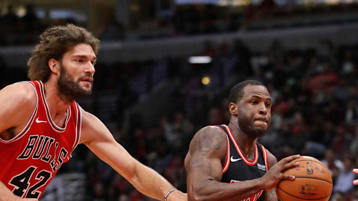 CHICAGO, IL - NOVEMBER 26: Dion Waiters #11 of the Miami Heat drives past Robin Lopez #42 of the Chicago Bulls at the United Center on November 26, 2017 in Chicago, Illinois. The Heat defeated the Bulls 100-93. NOTE TO USER: User expressly acknowledges and agrees that, by downloading and or using this photograph, User is consenting to the terms and conditions of the Getty Images License Agreement. (Photo by Jonathan Daniel/Getty Images)