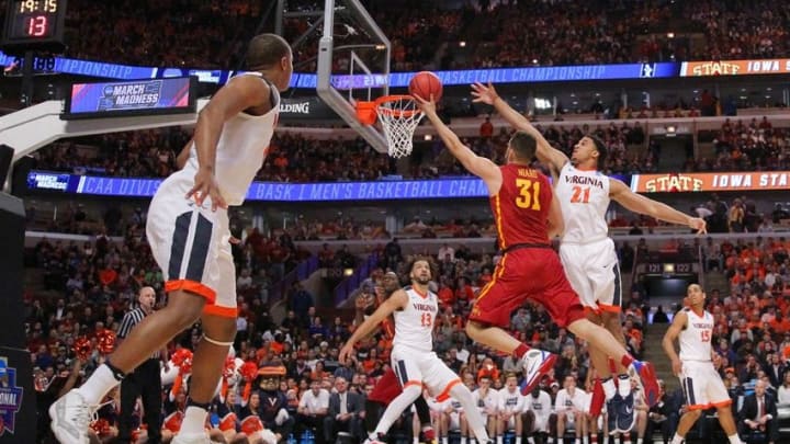 Mar 25, 2016; Chicago, IL, USA; Iowa State Cyclones forward Georges Niang (31) shoots against Virginia Cavaliers forward Isaiah Wilkins (21) in a semifinal game in the Midwest regional of the NCAA Tournament at United Center. Mandatory Credit: Dennis Wierzbicki-USA TODAY Sports