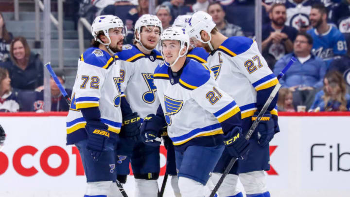 WINNIPEG, MB - DECEMBER 27: Justin Faulk #72, Robert Thomas #18, Tyler Bozak #21, Alexander Steen #20 and Alex Pietrangelo #27 of the St. Louis Blues celebrate a third period goal against the Winnipeg Jets at the Bell MTS Place on December 27, 2019 in Winnipeg, Manitoba, Canada. (Photo by Darcy Finley/NHLI via Getty Images)