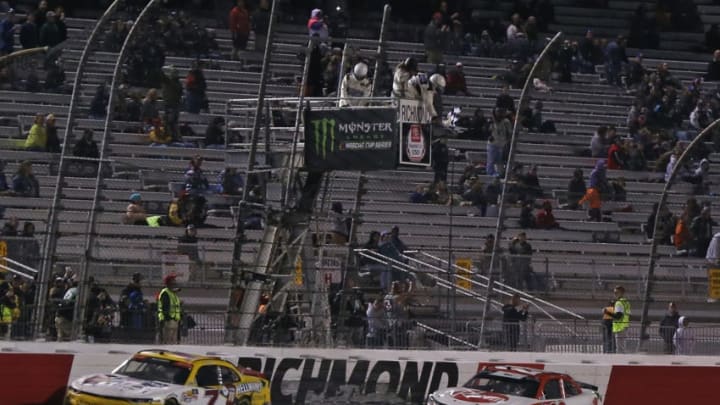 RICHMOND, VA - APRIL 20: Christopher Bell, driver of the #20 Rheem Toyota, takes the checkered flag to win the NASCAR Xfinity Series ToyotaCare 250 at Richmond Raceway on April 20, 2018 in Richmond, Virginia. (Photo by Matt Sullivan/Getty Images)